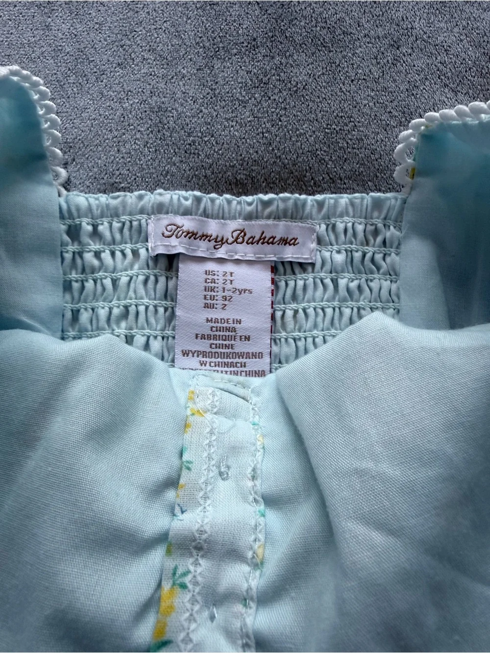Tommy Bahama Pale Blue Girls Smocked jumpsuit with Floral Trim